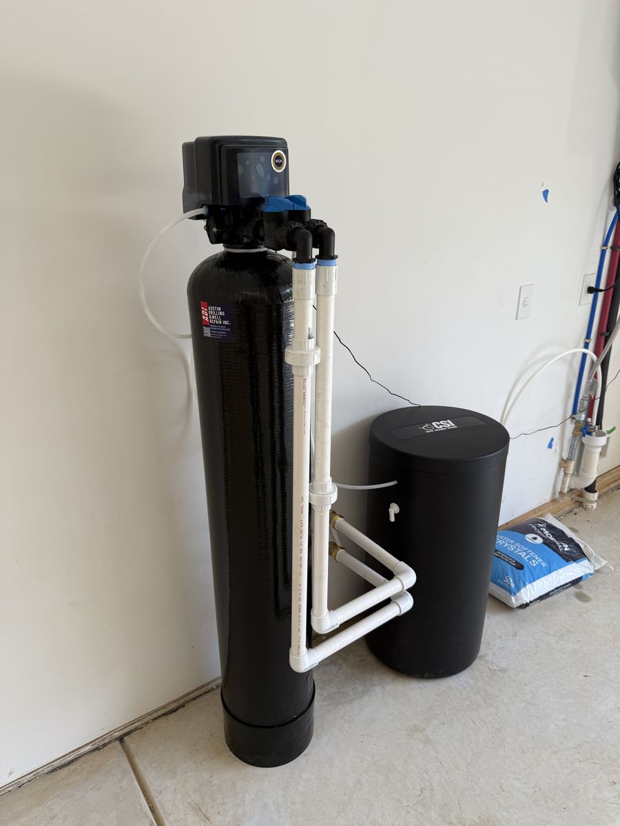 Water softener and filtration system installed in a home